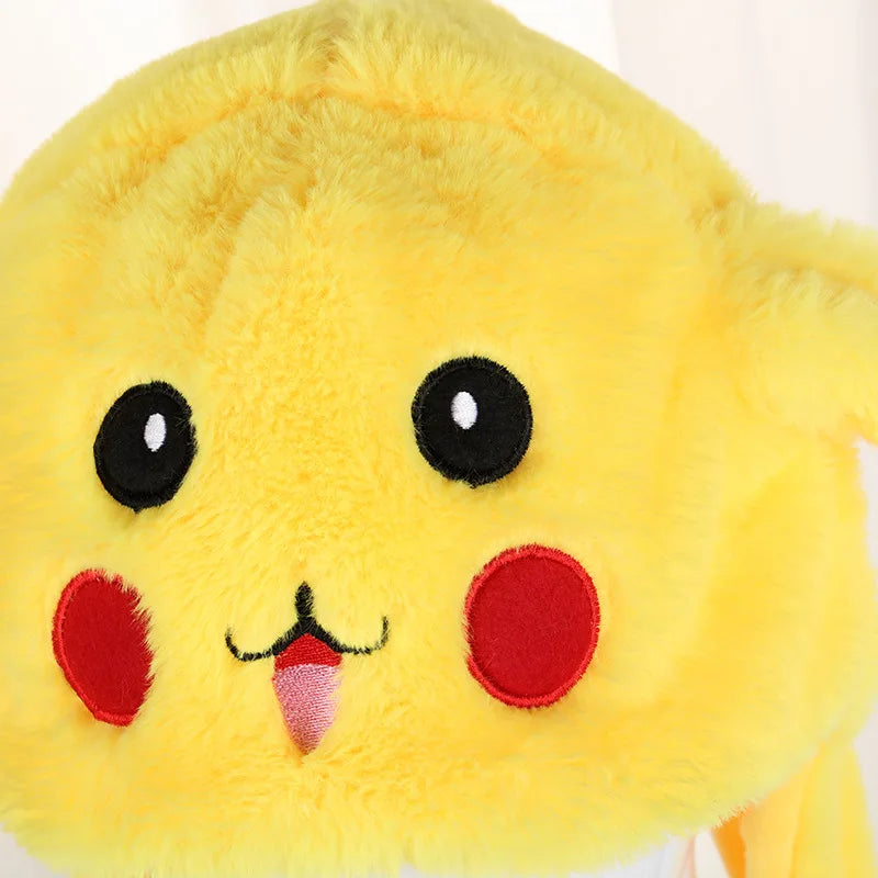 Close-up of a yellow plush toy with black eyes and red cheeks on a white background.
