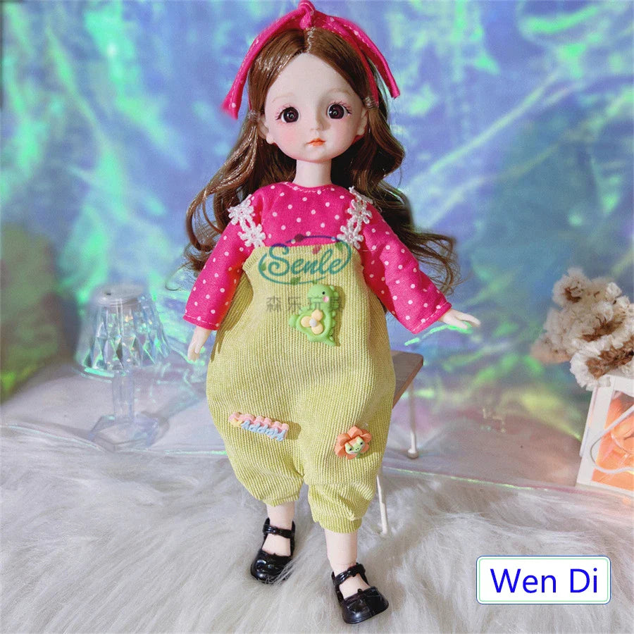  Doll wearing a pink top and green overalls with a blurred background.