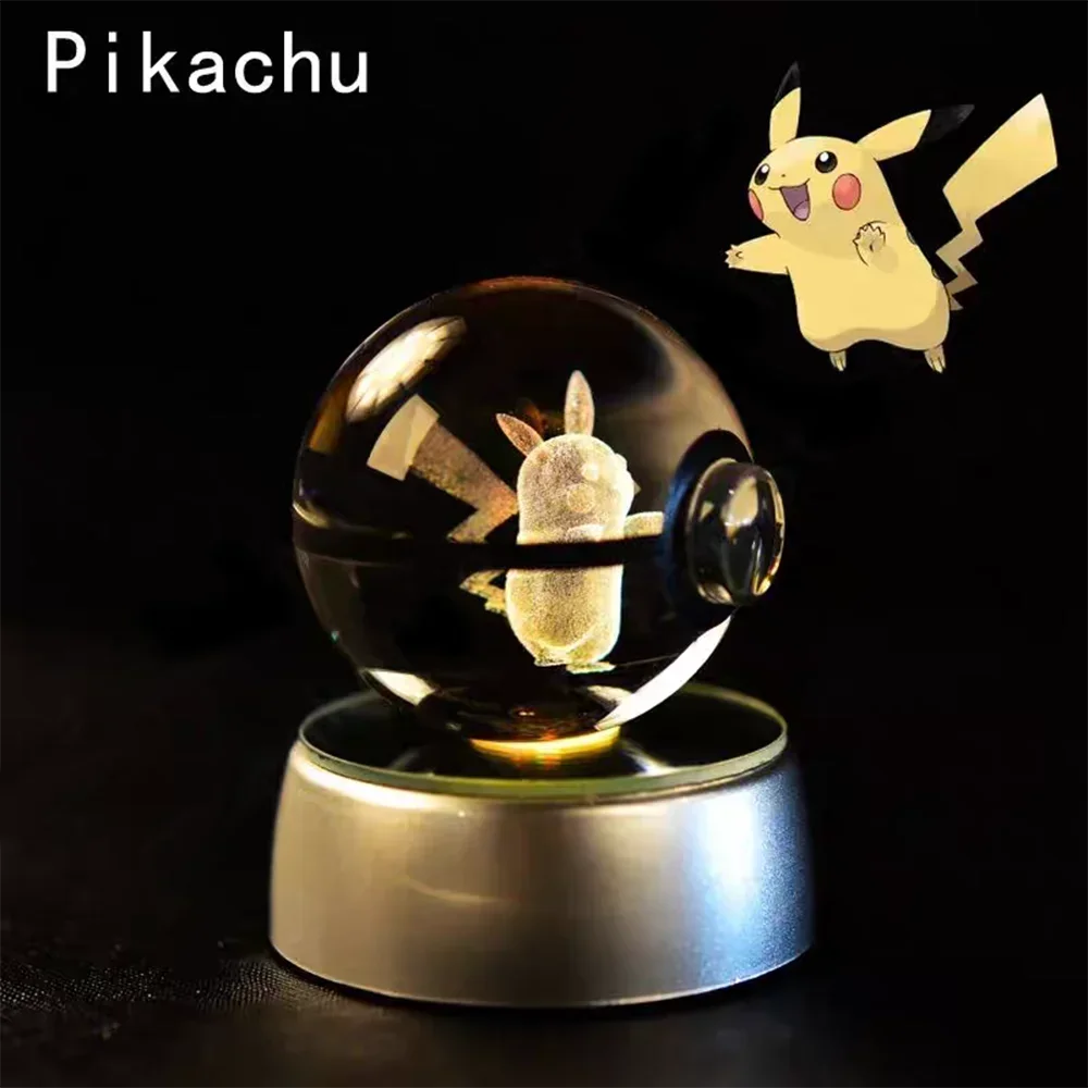Crystal ball with 3D Pikachu figure on a dark background.