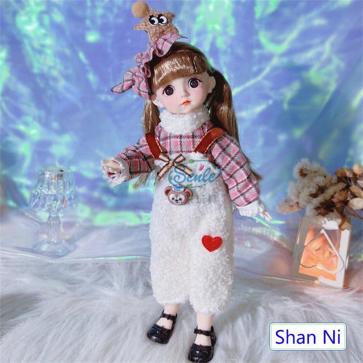 Doll in a plaid outfit with a heart design, standing on a textured surface with decorative elements.
