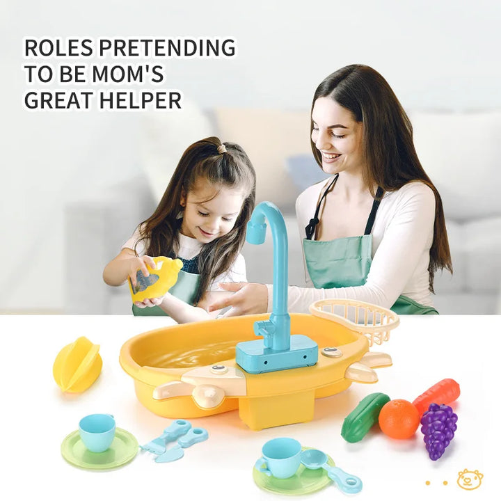 Woman and child playing with toy kitchen set on a white background.