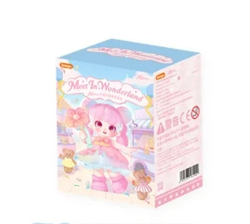 Box of a toy with a character on it, featuring pastel colors and a cute design.