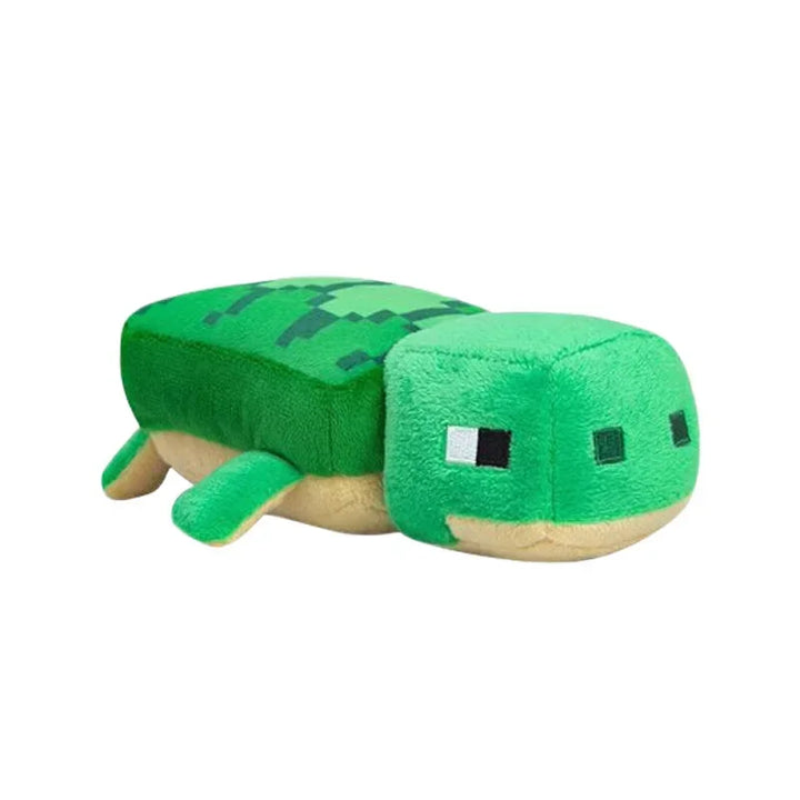 Green plush turtle toy on a white background.