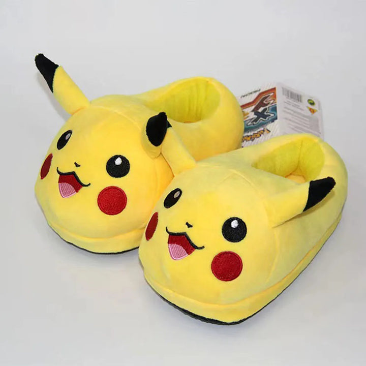 Yellow Pikachu slippers on a white background.