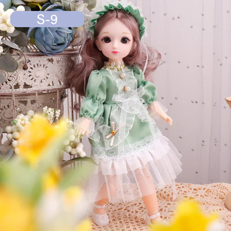  Doll in a green dress with flowers and decorative elements in the background.