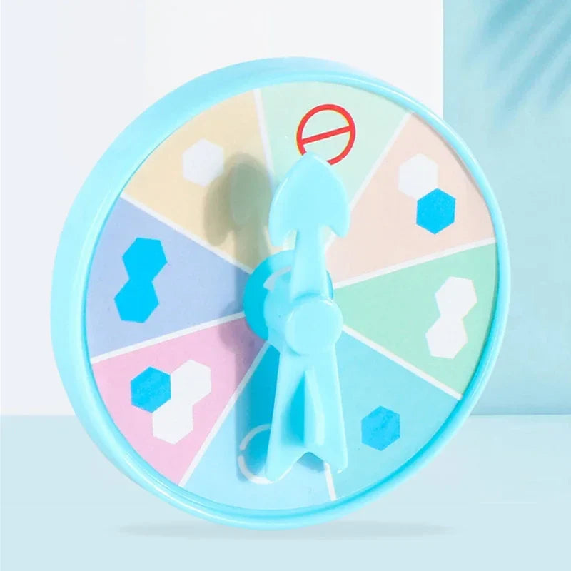 Colorful wheel with various shapes and a central figure on a light blue background.