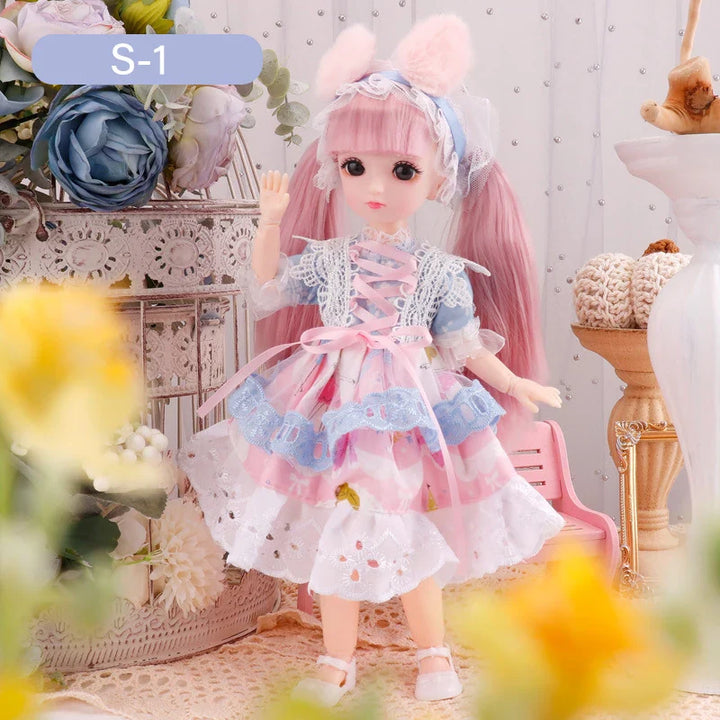 Doll with pink hair and dress in a decorative setting with flowers and furniture.