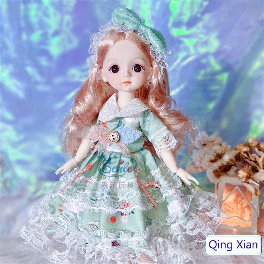 Doll with a green dress and lace details, sitting on a textured surface.