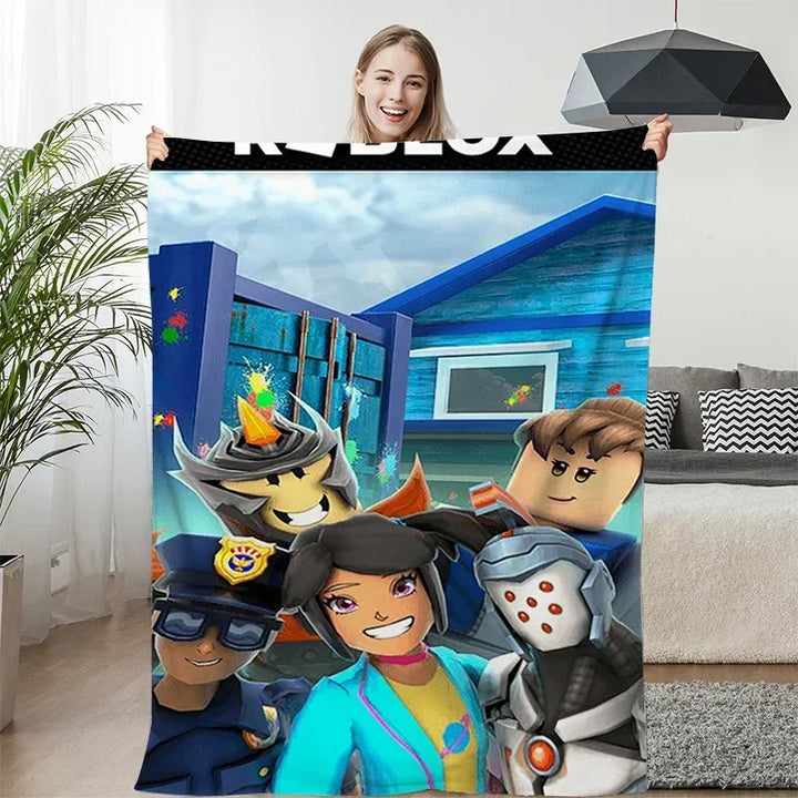 Person holding a Roblox-themed blanket with characters in a living room.
