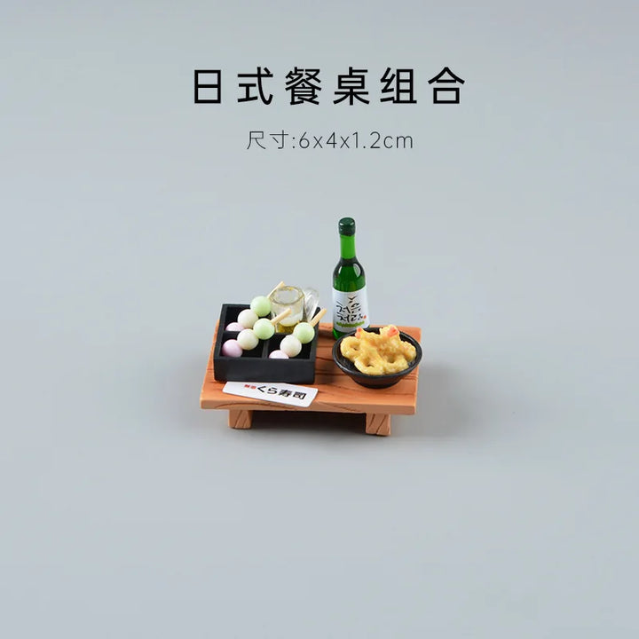 Miniature Japanese dining set with a bottle and food items on a gray background.