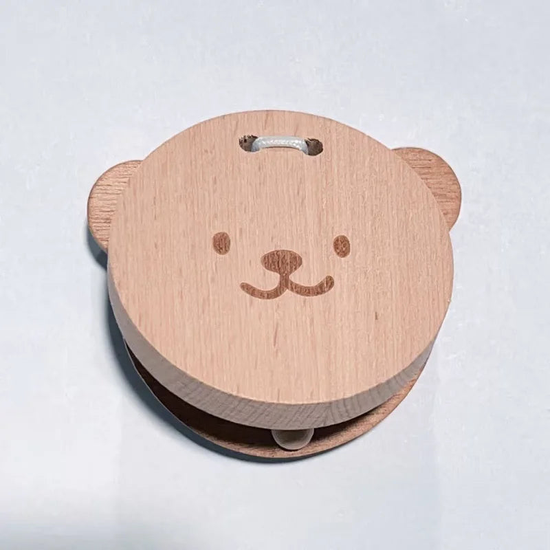 Wooden product with a bear face design on a white background.