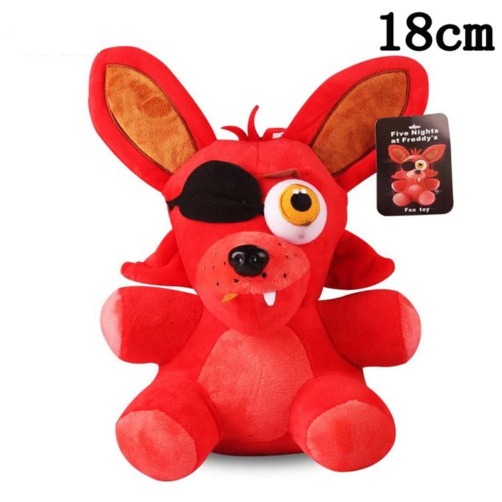 Red plush toy with an eye patch and tag, 18cm tall, on a white background.