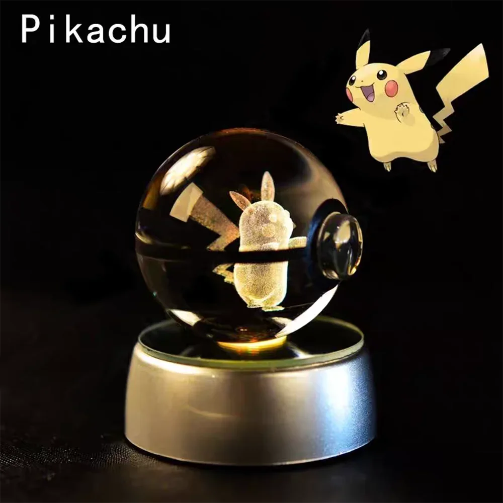 Crystal ball with 3D Pikachu figure on a dark background.