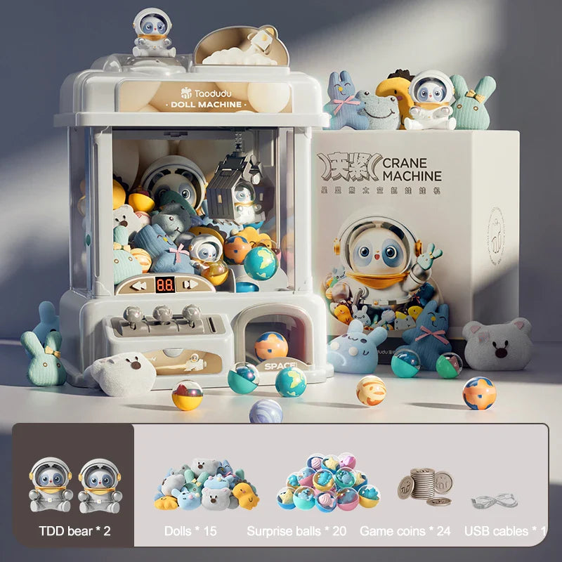 Toy crane machine with various plush toys and a display of prize types on a gray background.
