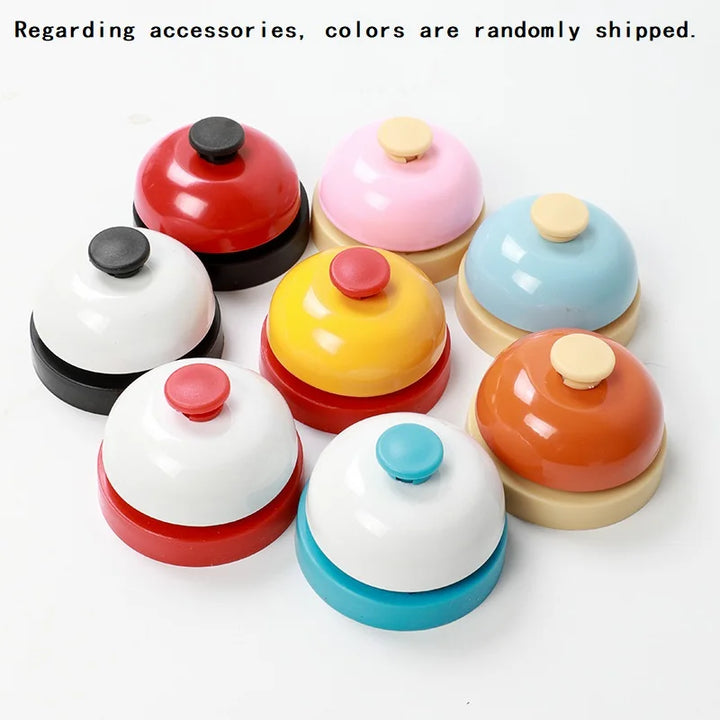 Colorful bell-shaped accessories on a white background with text indicating random color shipment.