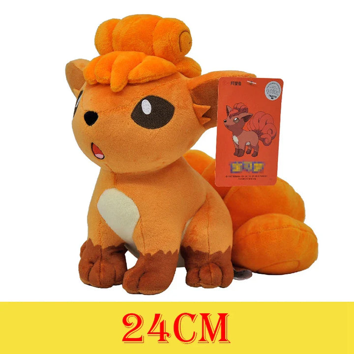 Plush toy with a tag on a white background, featuring a height measurement.