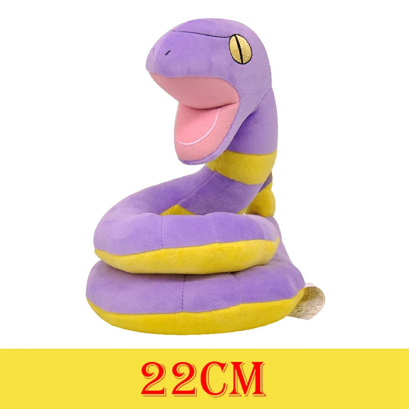 Plush toy snake with purple body and yellow head on a white background.