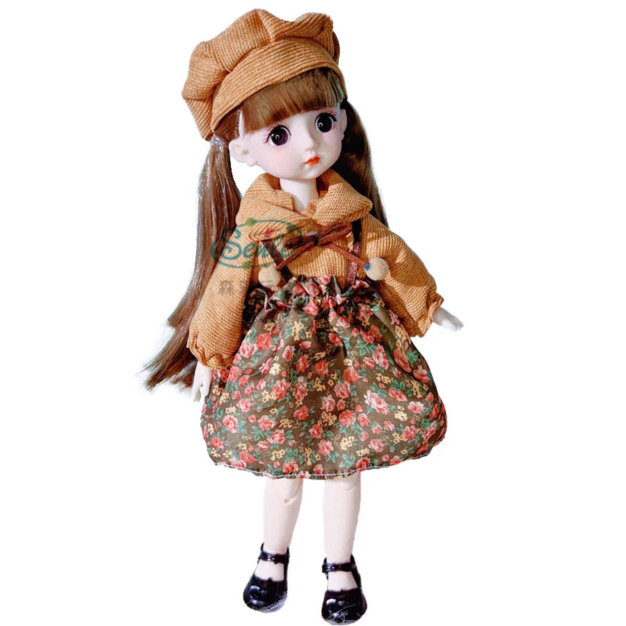 Doll wearing a floral dress and brown coat on a white background.