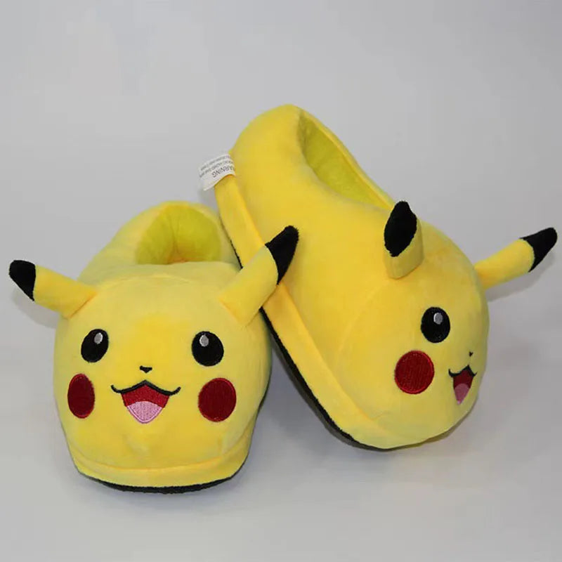 Yellow slippers with Pikachu design on a white background.