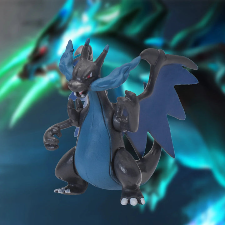 Dragon-like creature figurine with blue and gray colors against a blurred green and blue background.