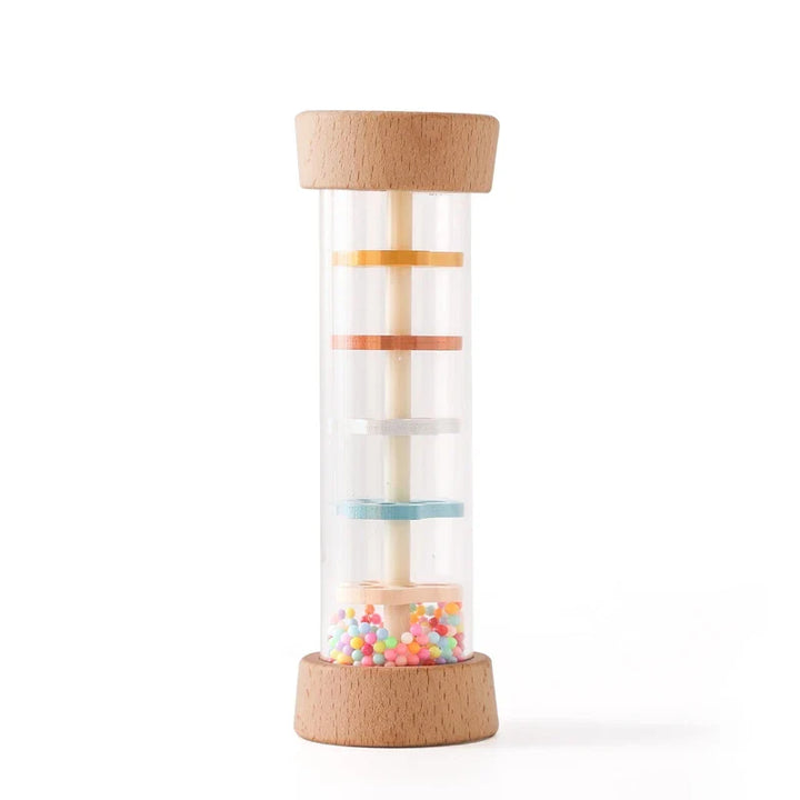 Clear cylindrical container with wooden top and bottom, filled with colorful beads on a white background.