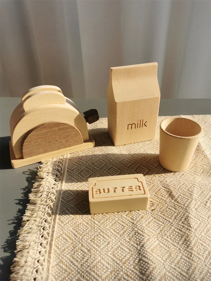 Wooden butter dish, milk carton, and butter block on a textured surface with a neutral background.