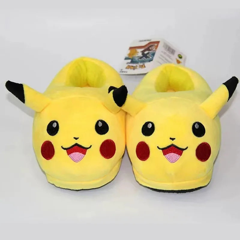 Yellow slippers with Pikachu design on a white background.