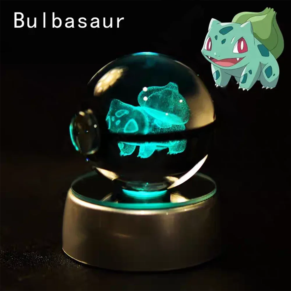 Glowing crystal ball with Bulbasaur design and additional image of Bulbasaur above on a dark background.