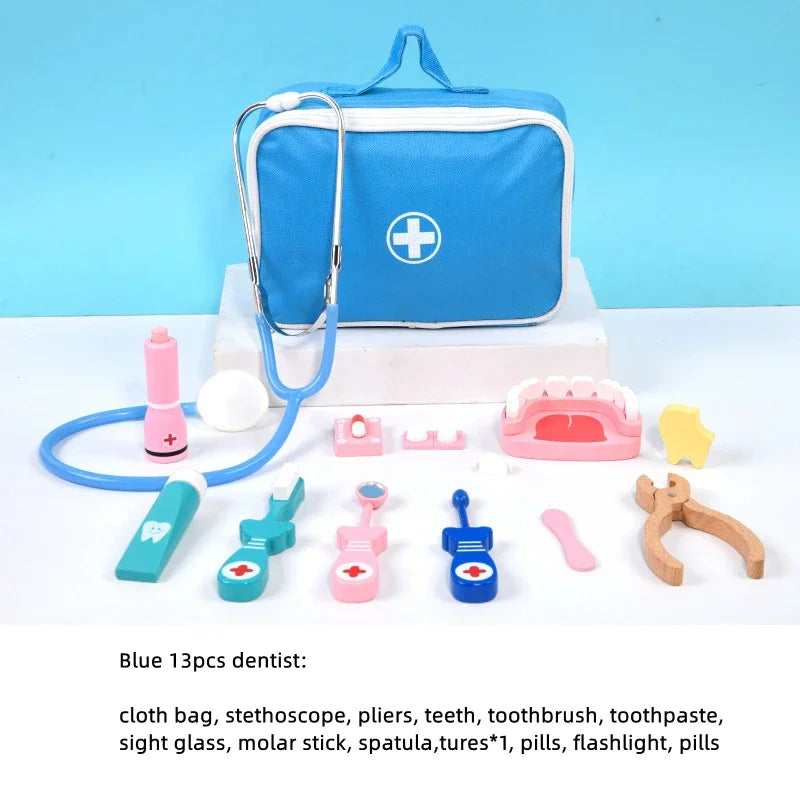 Set of toy dental tools with a blue carrying case on a white background.