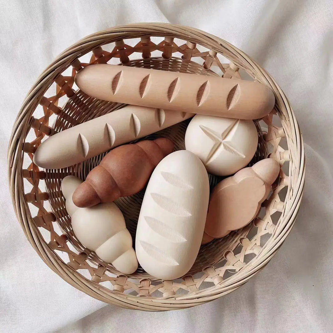 Basket with bread-shaped soaps on a light background.