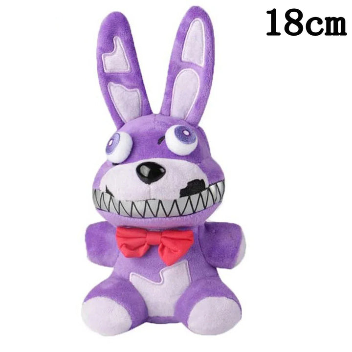 Purple plush toy with a red bow tie on a white background.