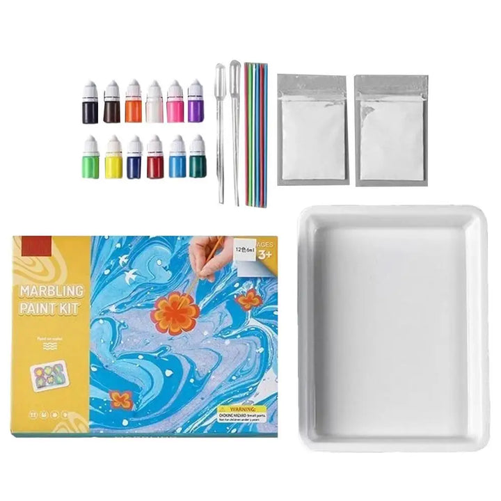 Marbling paint kit with paints, tools, and a tray on a white background.
