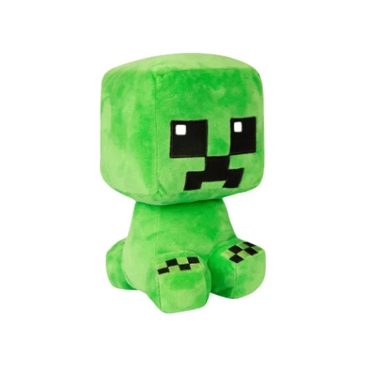 Green plush toy with a pixelated design on a white background.