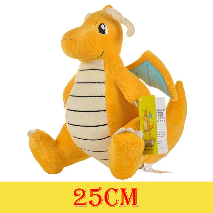 Yellow plush dragon toy with a visible brand tag on a white background.