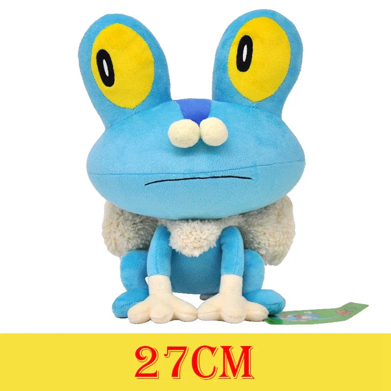 Blue plush toy with large yellow eyes on a white background.