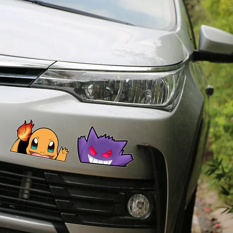 Car with cartoon character stickers on the front.
