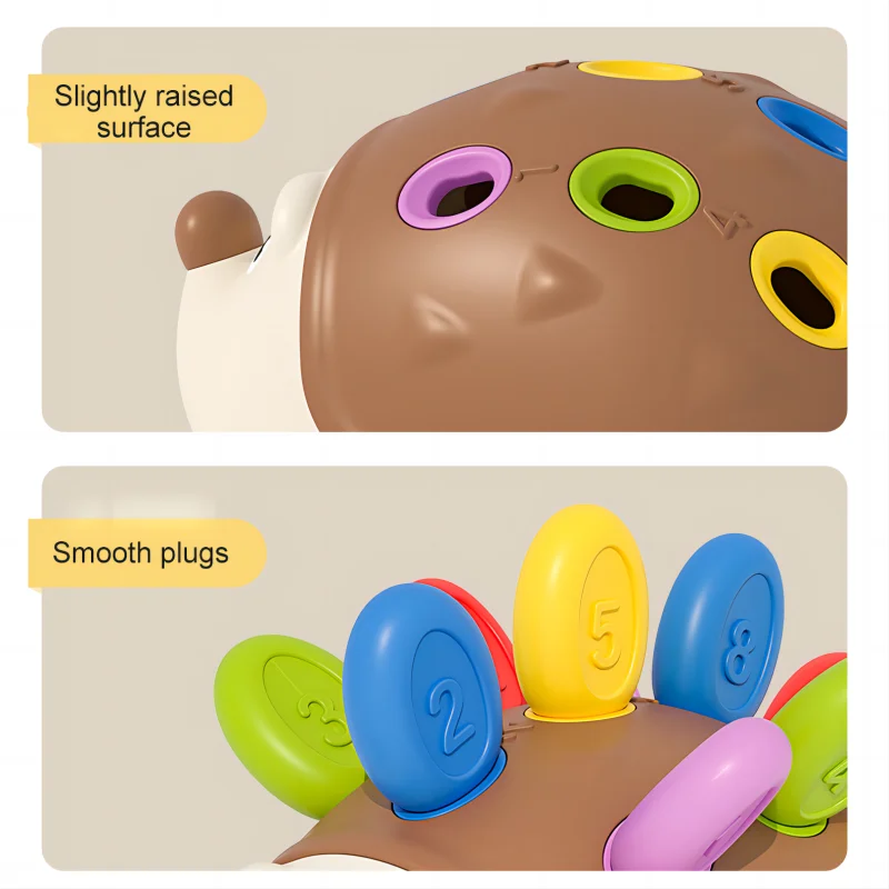 Toy hedgehog with colorful smooth plugs on a beige background.