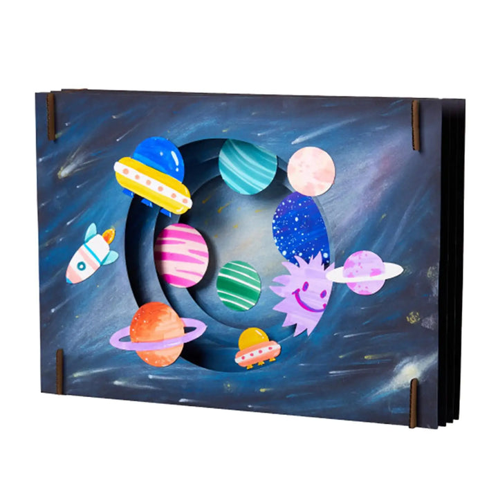 Children's space-themed wall art with colorful planets and rockets on a blue background.