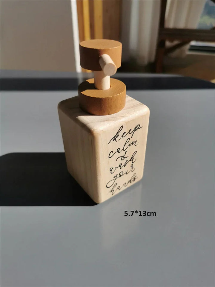 Decorative bottle with wooden top on a gray surface, featuring text and dimensions.