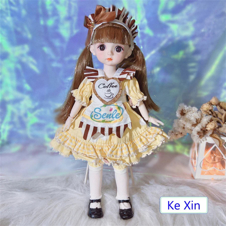 Doll in a yellow dress with a coffee sign, standing on a textured surface with a blurred background.