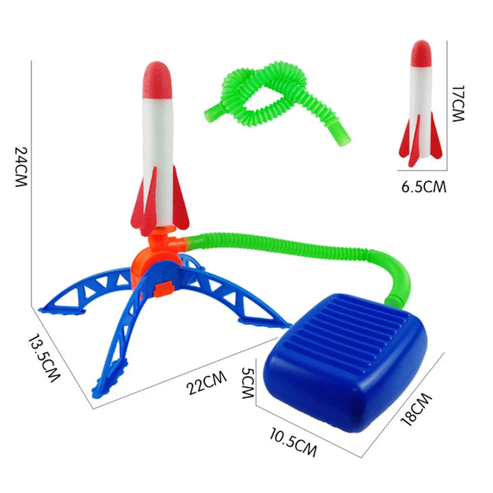 Toy rocket set with blue launch pad, green coiled rope, and red and white rocket on a white background with measurements.