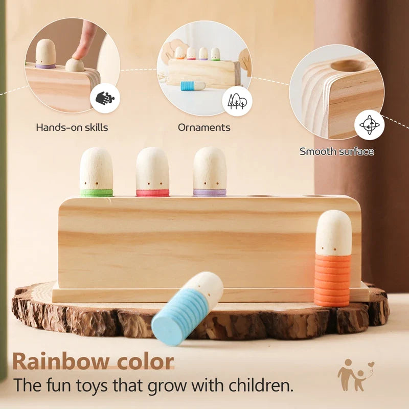 Wooden toy set with colorful cylindrical figures on a wooden base, highlighting features like hands-on skills and smooth surface.