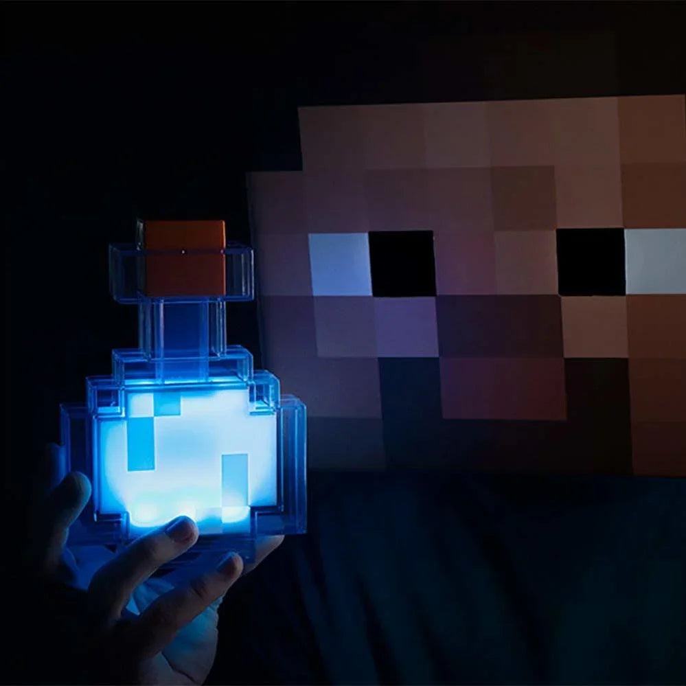 Hand holding a pixelated light-up block in front of a pixelated face on a dark background.