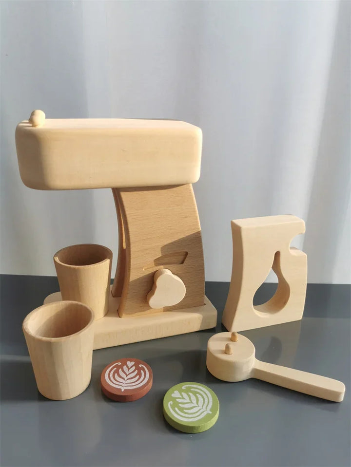 Wooden toy coffee set with various pieces on a gray surface.