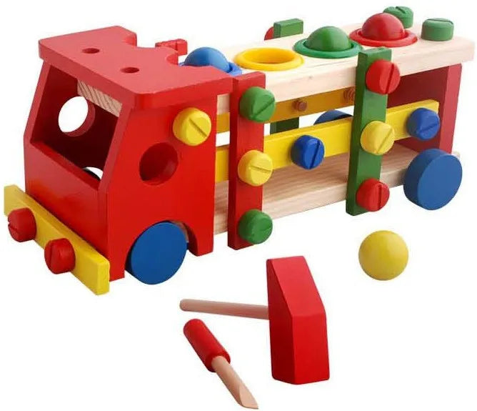 Colorful wooden toy with a truck shape and various shaped blocks on a white background.