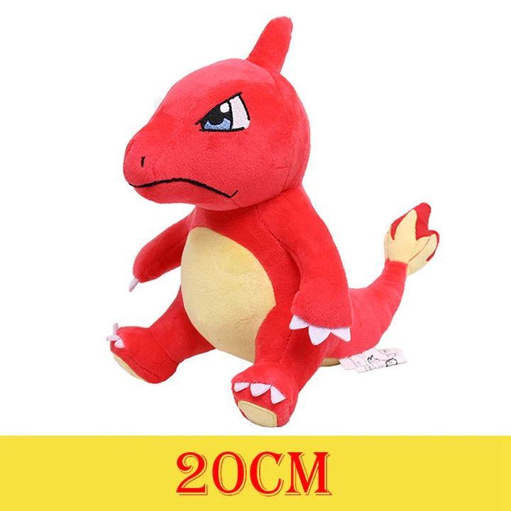 Red plush toy with a yellow belly on a white background.