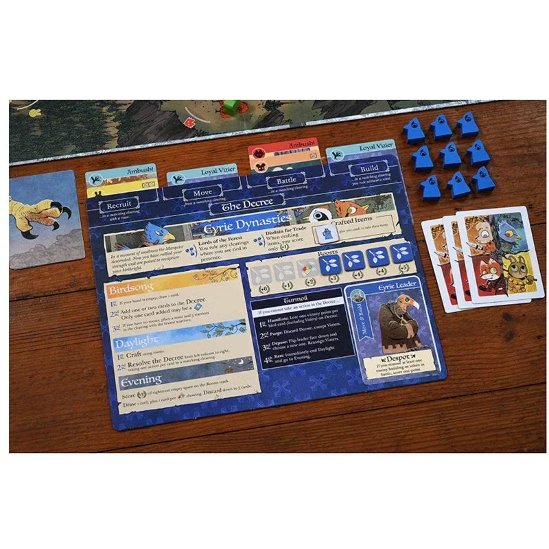 Board game components including cards and pieces on a wooden surface.