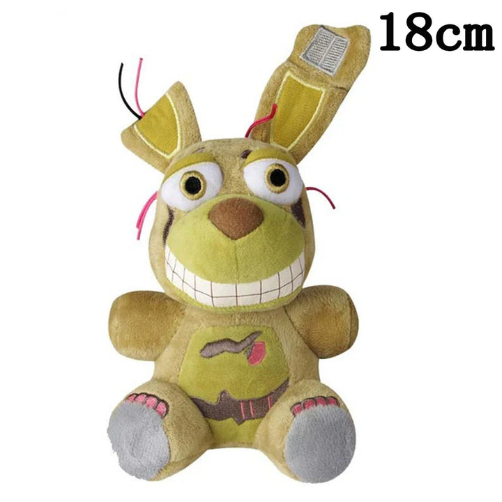 Plush toy with a green face and brown body, standing on a white background.