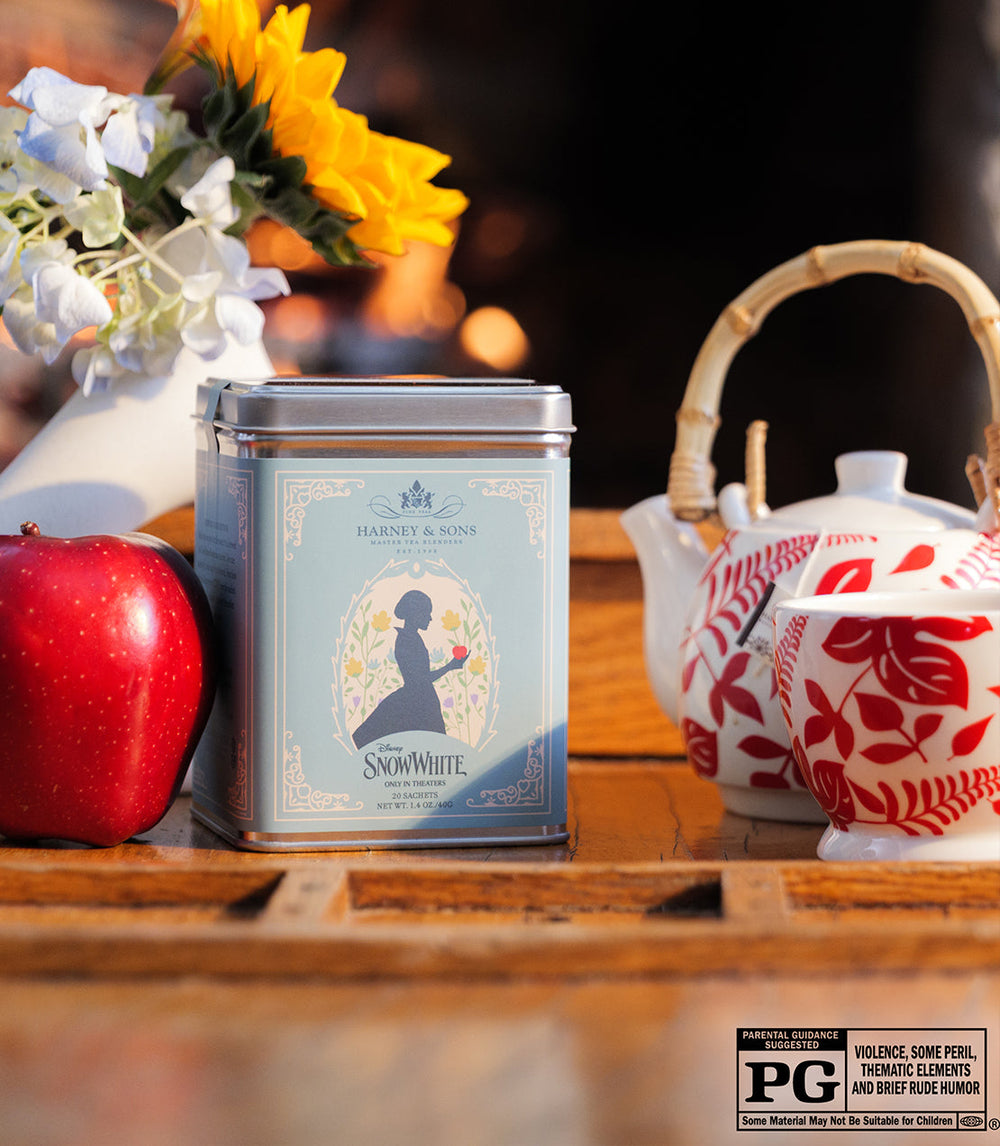 Snow White Tea Tin of 20 Sachets with Background.