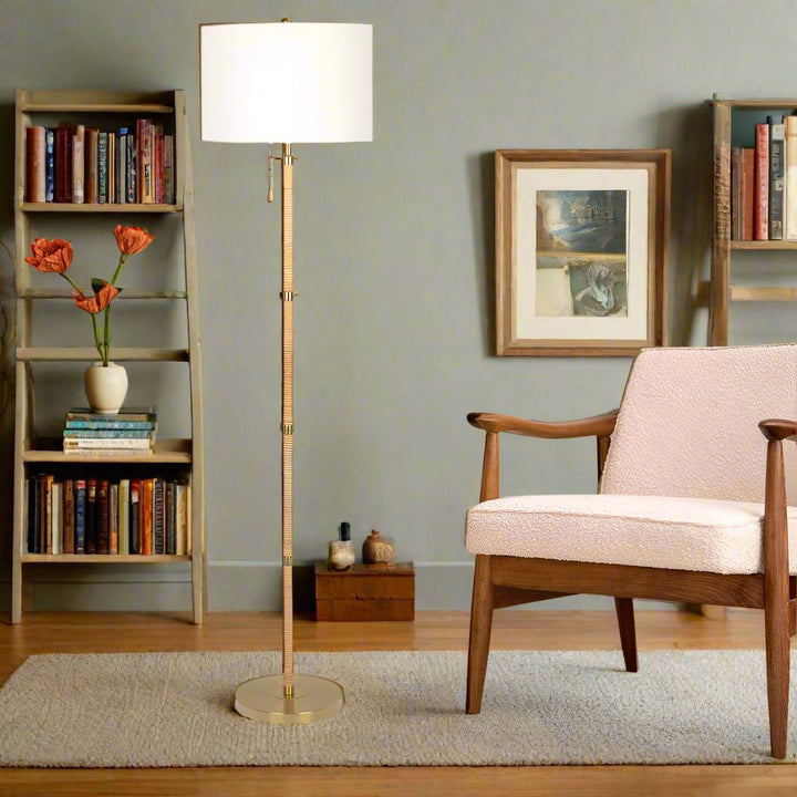 Stellar Wood Rattan Tube, Gold Brass Metal and White Linen Shade Floor Lamp in Room.